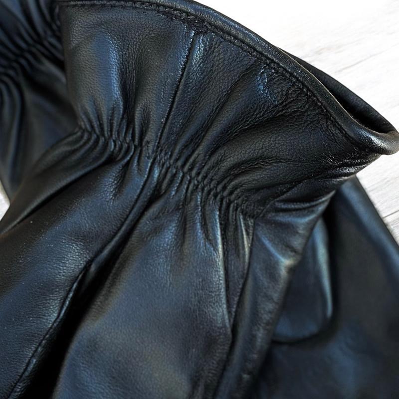 Nordens dame rulamsluffe i blød sort skind med rulamsfoer - Freja skind