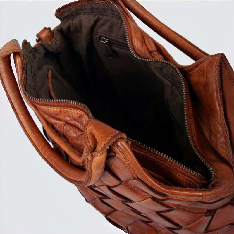 Fairfield crossbody-väska i flätat från Montana i cognacbuffel