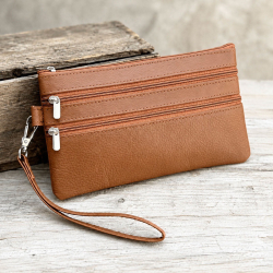 Lovisa clutch med håndledsrem - Blød cognac lammeskind