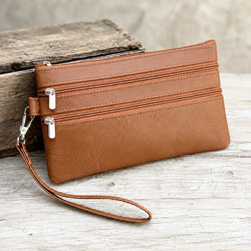 Lovisa clutch med håndledsrem - lammeskind - Freja skind
