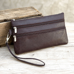 Lovisa clutch med håndledsrem - Blød brun lammeskind