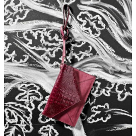 Elegant clutch Partridge i croco präglat skinn med rem